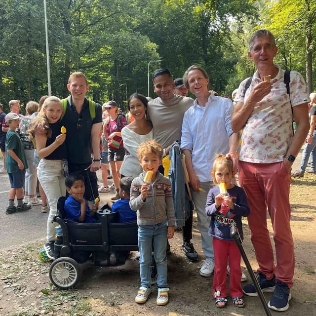 The Souvenirs team, with their children, on the march